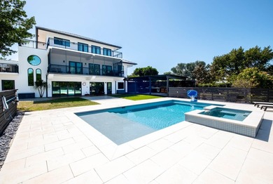 Beautifully remodeled 1998 concrete home is situated on a - photo 5