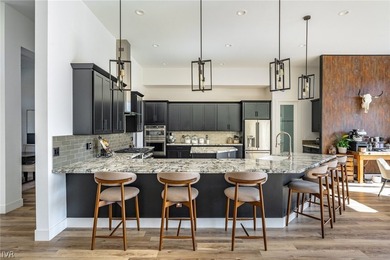 Set within the gated Champion Hills enclave of Somersett beneath - photo 6