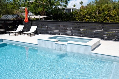 Beautifully remodeled 1998 concrete home is situated on a - photo 7