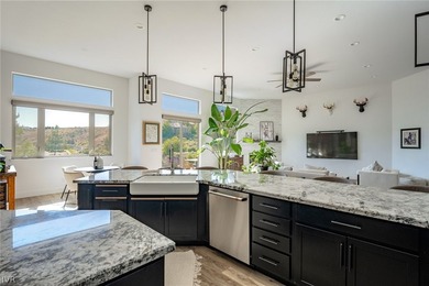 Set within the gated Champion Hills enclave of Somersett beneath - photo 7