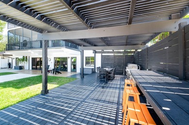 Beautifully remodeled 1998 concrete home is situated on a - photo 9