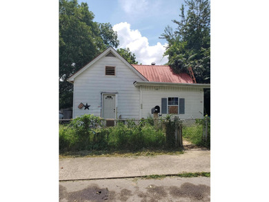 Endless potential awaits! This 2-bedroom, 1-bath fixer-upper - photo 1