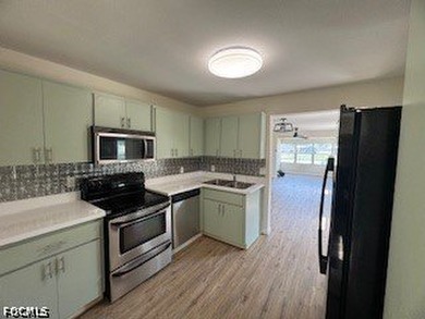 Welcome to this beautifully remodeled 4 bedroom, 2 bath home - photo 5