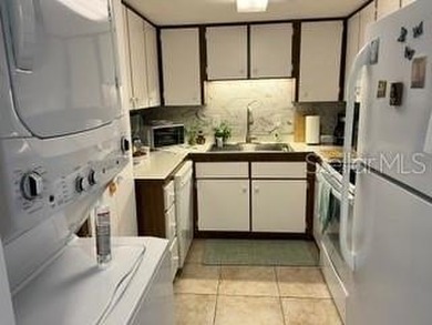 Beautiful first floor 2 bedroom 2 bath condo located directly - photo 2