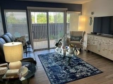 Beautiful first floor 2 bedroom 2 bath condo located directly - photo 7
