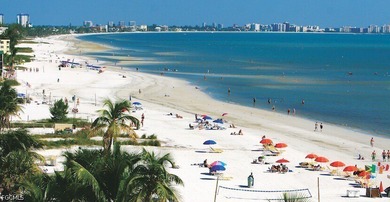 Experience the ultimate beachside lifestyle in this beautifully - photo 1