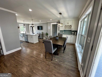 LAKE FRONT, HUGE 8 CAR GARAGE, POOL, DEEP WATER DOCK WITH LIFT - photo 4
