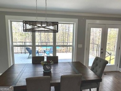 LAKE FRONT, HUGE 8 CAR GARAGE, POOL, DEEP WATER DOCK WITH LIFT - photo 7