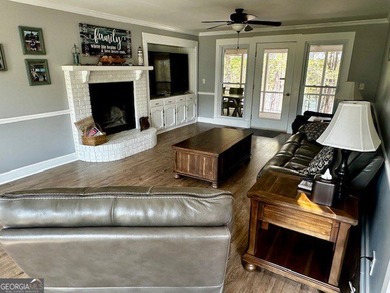 LAKE FRONT, HUGE 8 CAR GARAGE, POOL, DEEP WATER DOCK WITH LIFT - photo 9