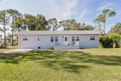 Own the land, skip the lot rent, and enjoy turnkey canal-front - photo 3