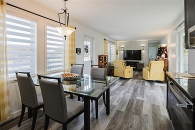Own the land, skip the lot rent, and enjoy turnkey canal-front - photo 8