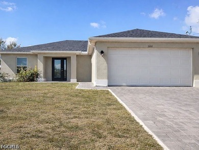 This spacious 4-bedroom, 2-bath home features a 2-car garage and - photo 1
