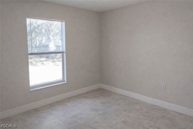 This spacious 4-bedroom, 2-bath home features a 2-car garage and - photo 7