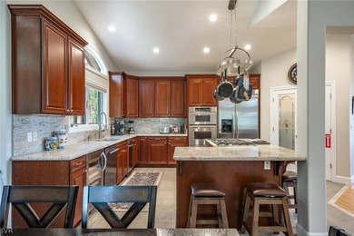Nestled on a spacious nearly half-acre lot in a lower-elevation - photo 4