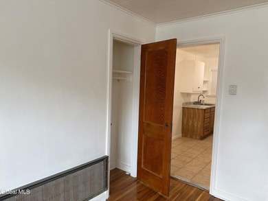 Apartment 1A is vacant. It is located on the first-floor right - photo 7