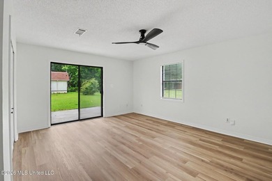 Recently renovated and move-in ready, this spacious 4-bedroom, 2 - photo 12