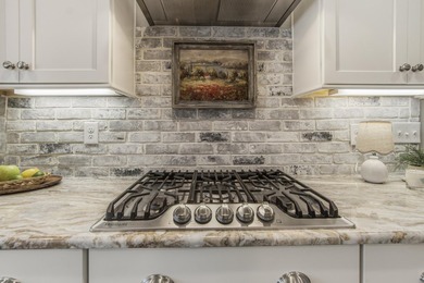 *Seller will contribute $10,000 to buyer's closing costs or - photo 13
