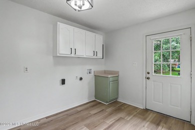 Recently renovated and move-in ready, this spacious 4-bedroom, 2 - photo 16