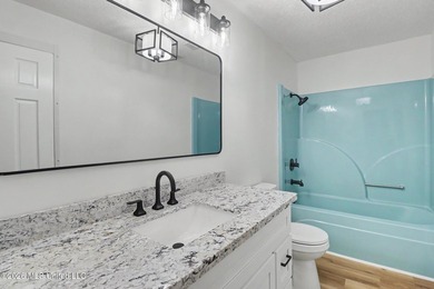Recently renovated and move-in ready, this spacious 4-bedroom, 2 - photo 25