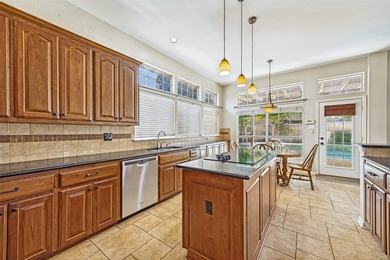 Wonderful single-story home offering tranquil canal views right - photo 6
