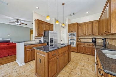 Wonderful single-story home offering tranquil canal views right - photo 7