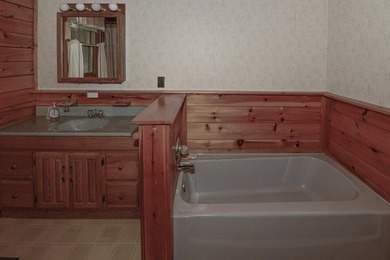 Cozy 2 BR, 2 Bath log sided home with knotty pine interior on a - photo 37