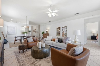 Welcome to easy coastal living in the highly sought-after gated - photo 4