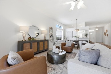 Welcome to easy coastal living in the highly sought-after gated - photo 5