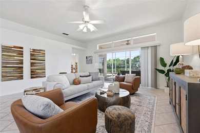 Welcome to easy coastal living in the highly sought-after gated - photo 7
