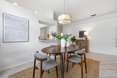 Welcome to easy coastal living in the highly sought-after gated - photo 8