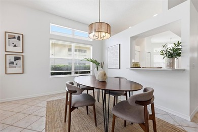 Welcome to easy coastal living in the highly sought-after gated - photo 9