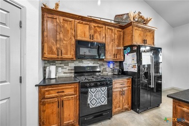THIS IS THE ONE! This stunning 4-bedroom, 3-bath open-concept - photo 11