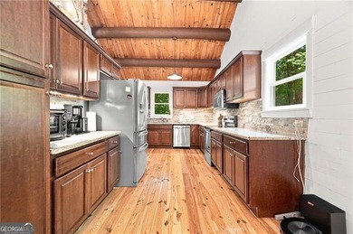 This light and bright 4 BR with 2 Full Bath design home is a - photo 12