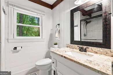 This light and bright 4 BR with 2 Full Bath design home is a - photo 15
