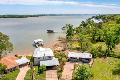 Family fun at the lake.  Charming home with est. 90 ft. of - Lake Home For Sale in Azle, Texas