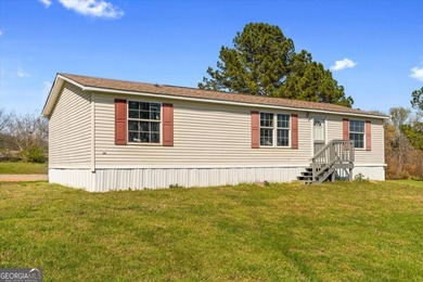 BACK ON THE MARKET AT NO FAULT TO SELLER Spacious double-wide - photo 1