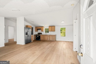 BACK ON THE MARKET AT NO FAULT TO SELLER Spacious double-wide - photo 3