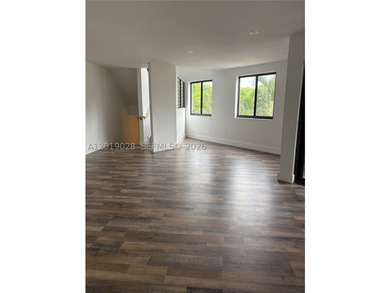 Welcome to this beautifully renovated three-story corner - photo 6