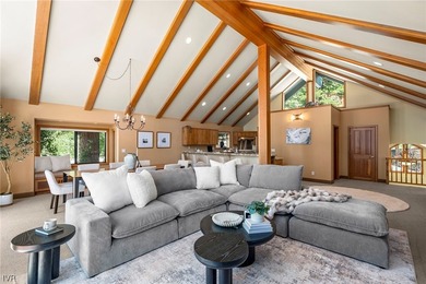 Sweeping lake views take center stage from all three levels of - photo 9