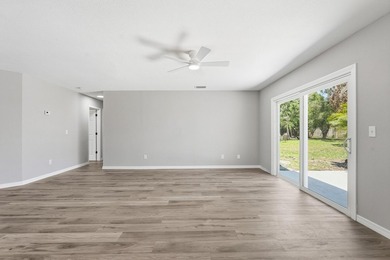 BRAND NEW ROOF, NEW A/C SYSTEM, FULLY RENOVATED .This - photo 2