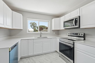 BRAND NEW ROOF, NEW A/C SYSTEM, FULLY RENOVATED .This - photo 3