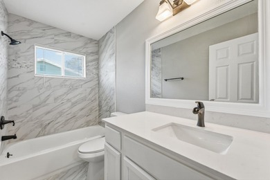 BRAND NEW ROOF, NEW A/C SYSTEM, FULLY RENOVATED .This - photo 4