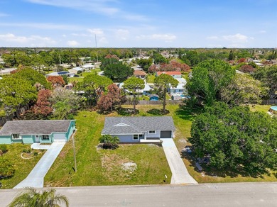 BRAND NEW ROOF, NEW A/C SYSTEM, FULLY RENOVATED .This - photo 5