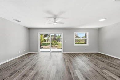 BRAND NEW ROOF, NEW A/C SYSTEM, FULLY RENOVATED .This - photo 7