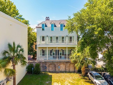 Experience the pinnacle of downtown Charleston living in this - photo 2