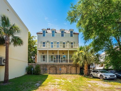 Experience the pinnacle of downtown Charleston living in this - photo 3