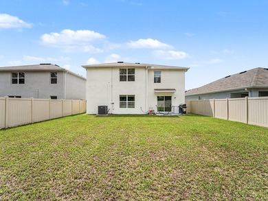 Welcome to this modern two-story residence located in the - photo 3