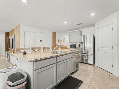 Welcome to this modern two-story residence located in the - photo 10