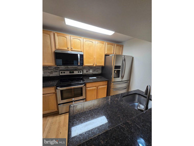 Discover the charm of Penderbrook Square Condominiums, where - photo 11