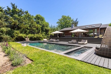 Discover a private Hamptons sanctuary where modern luxury meets - photo 4